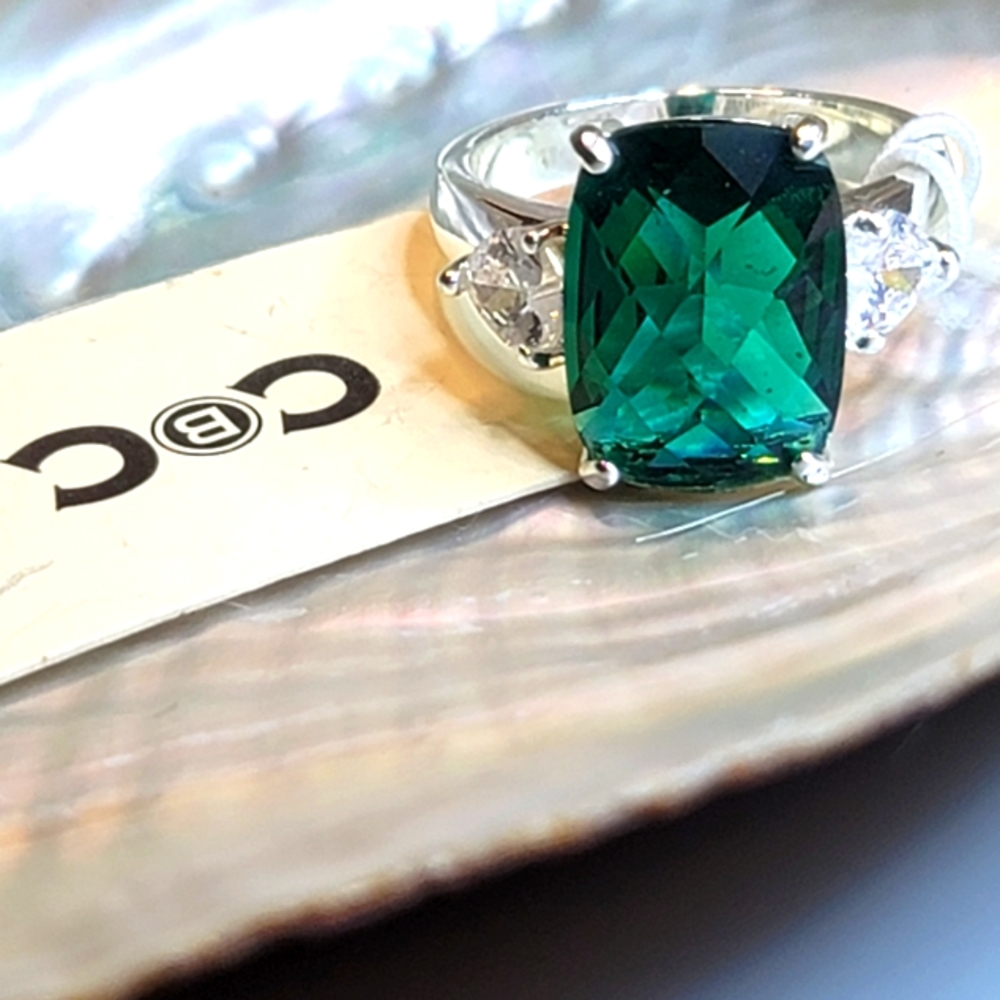 SOLD. Green Glass Rhinestone Ring by CBC. Size 8, new with tags.